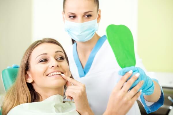 Properly Dealing with Broken Dental Bridges and Crowns
